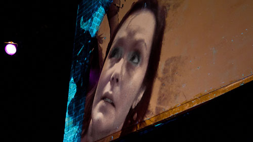 Elise Morrison performs Through the Looking Glass: The Surveillance Cabaret